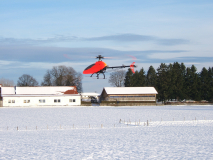 Logo vor Schneelandschaft