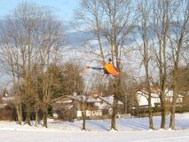 Logo vor Schneelandschaft