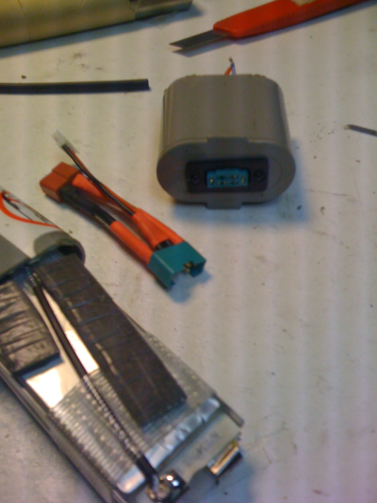 Akku und Lade-Balancer-Adapter